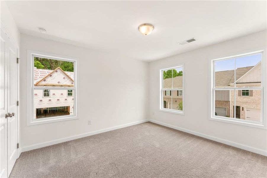 Spacious, unfurnished interior of a new home in River Walk Place, Lawrenceville (Image 22).