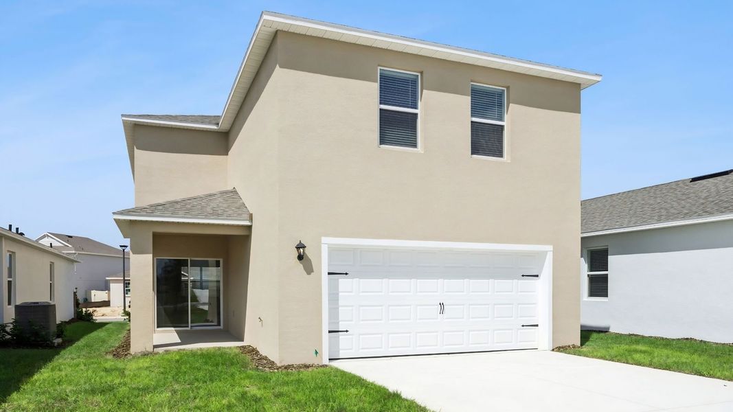 Representative exterior photo of a completed home built from the Campbell by D.R. Horton in Crossroads at Kelly Park, Apopka, FL (Image 2).