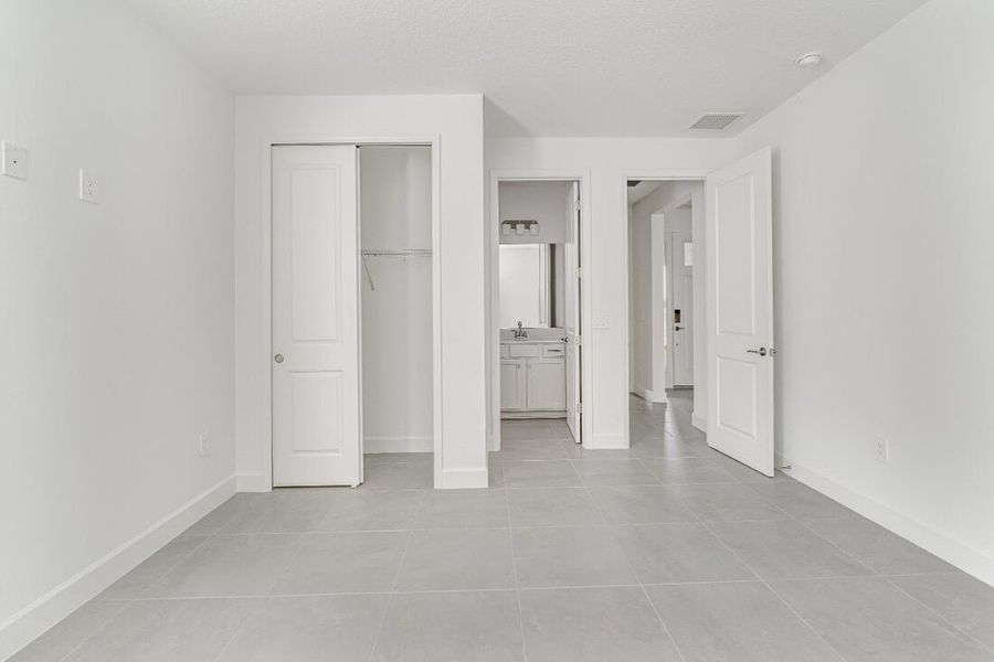Representative unfurnished interior of a home built from the Saint Clair by Taylor Morrison in Harvest at Ovation, Winter Garden (Image 34).