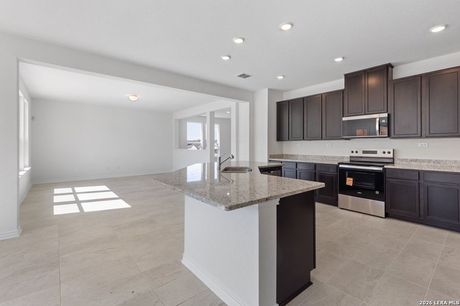 Furnished interior view inside a new home in Hidden Bluffs at TRP, San Antonio (Image 12).