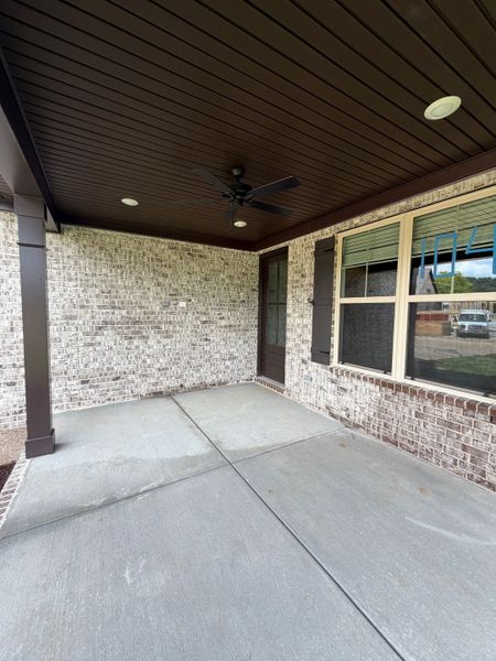 Exterior details and patio area of a home in Bluebird Hollow at Autumn Ridge, Spring Hill (Image 3).