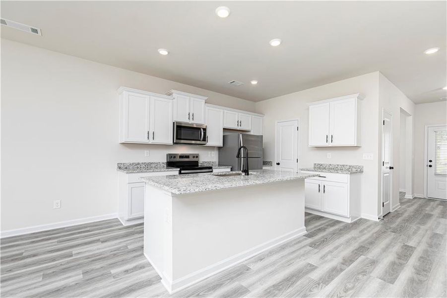 Furnished interior view inside a new home in Lake Preserve at Jackson Trail, Jefferson (Image 10). Furnished interior view inside a new home in Lake Preserve at Jackson Trail, Jefferson (Image 10).
