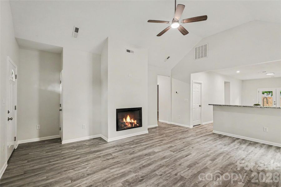 Spacious Living Room with Vaulted Ceiling