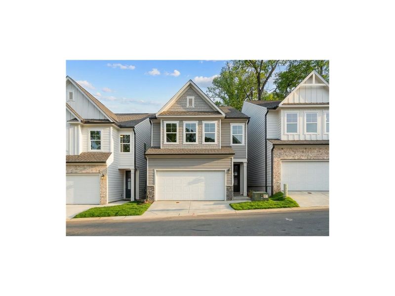 Front exterior of a new home in The Village at Shallowford, Kennesaw, GA, highlighting curb appeal (Image 1). Front exterior of a new home in The Village at Shallowford, Kennesaw, GA, highlighting curb appeal (Image 1).