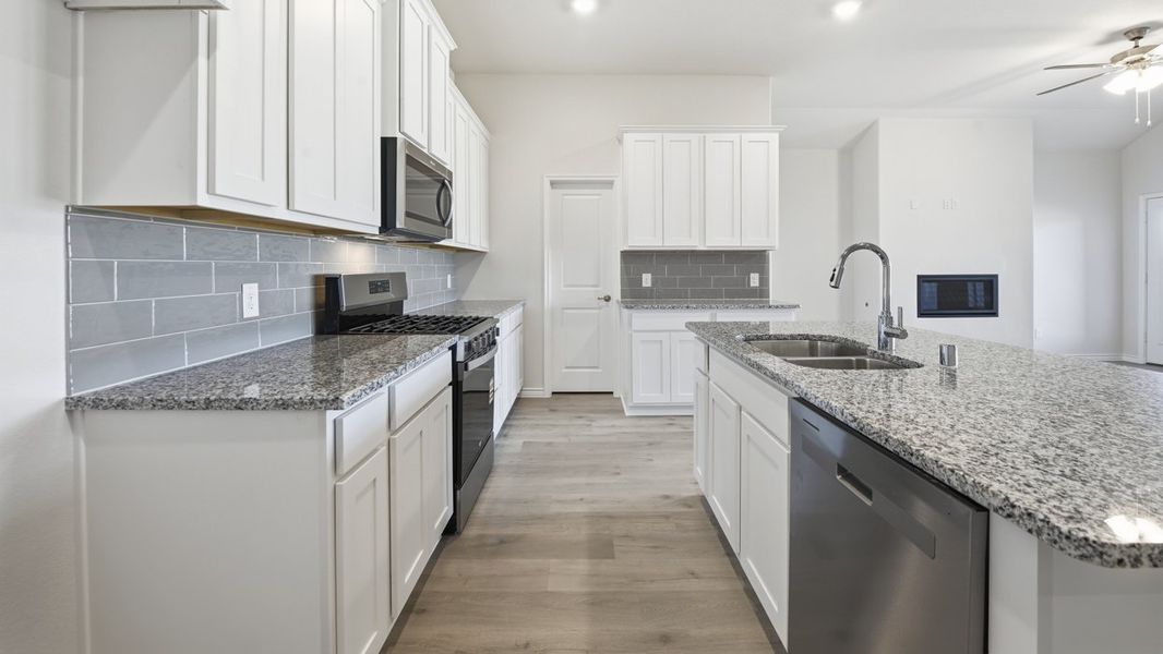 Representative furnished interior of a home built from the Harbour by D.R. Horton in Silverado, Aubrey (Image 4).