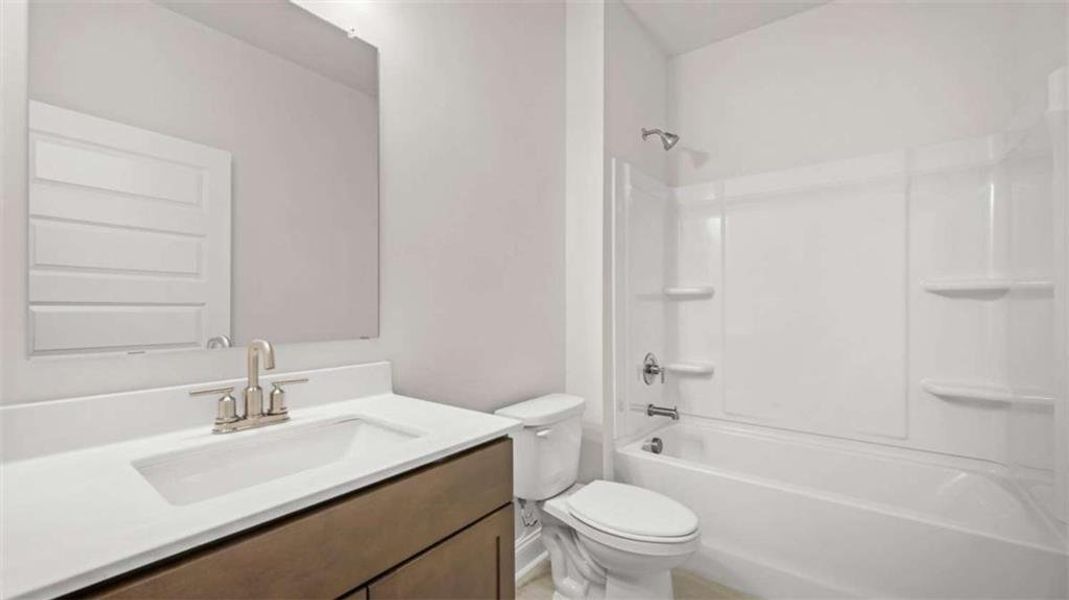 Furnished interior view inside a new home in Oak Ridge Meadows - Active Adult, Locust Grove (Image 11).