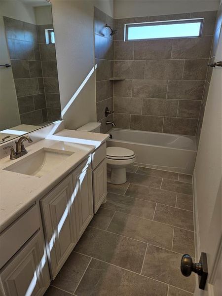 Furnished interior in a model home at Pecan Grove in Whitesboro (Image 4).