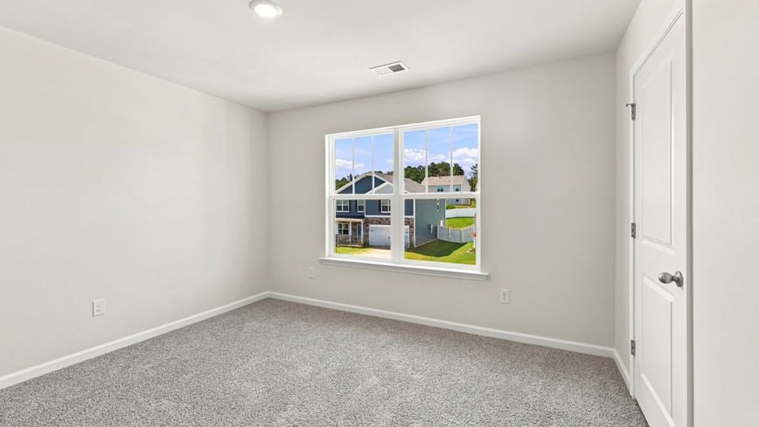 Spacious, unfurnished interior of a new home in Spring Ridge, Anderson (Image 37).