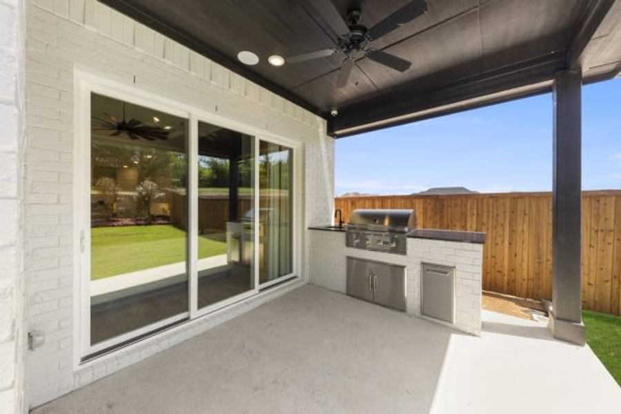 Exterior details and patio area of a home in The Highlands, Rockwall (Image 3).
