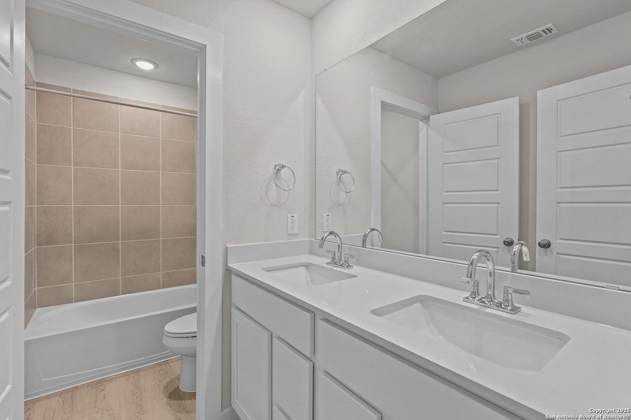 Furnished interior view inside a new home in Senna, Leon Valley (Image 11). Furnished interior view inside a new home in Senna, Leon Valley (Image 11).