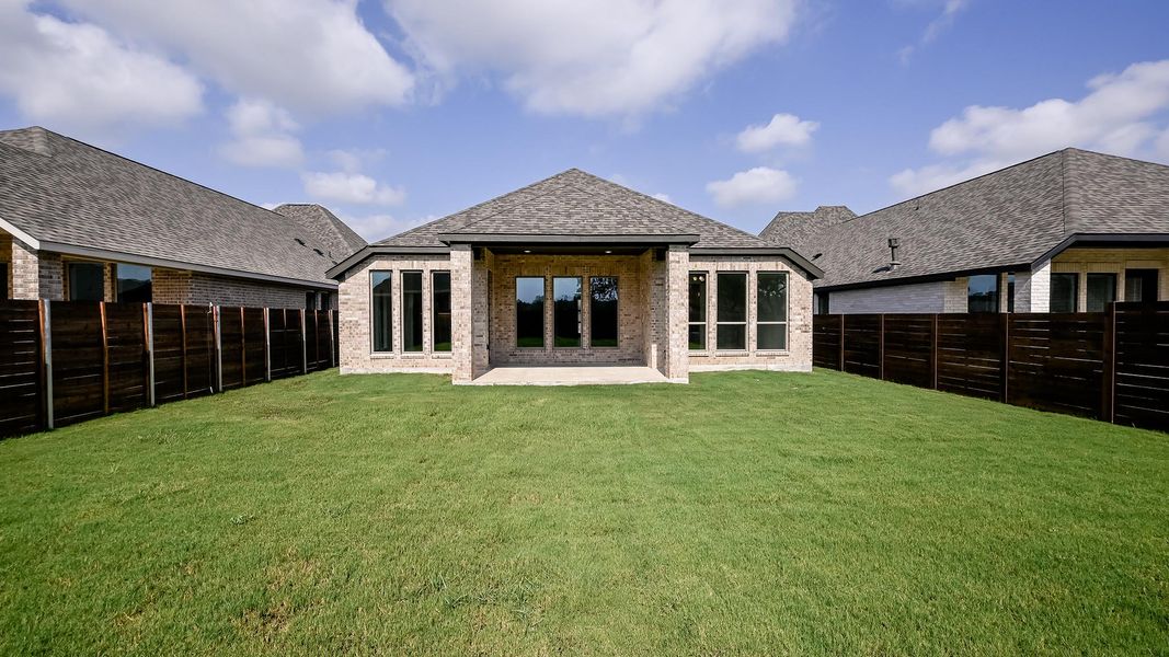 Exterior details and patio area of a home in Juniper Springs, Lockhart (Image 2).