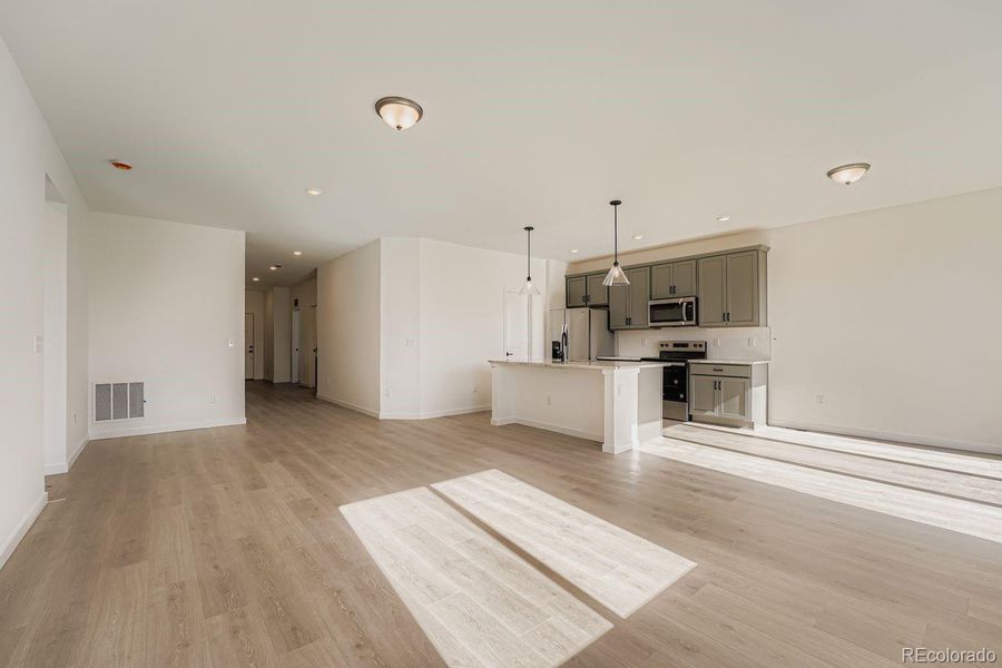 Images not from actual home, but are from same floor plan.