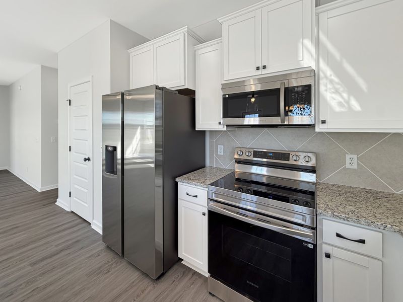 Furnished interior view inside a new home in The Village at Sassafras, Allenhurst (Image 8).