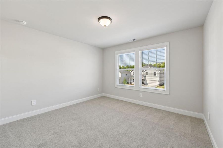 Spacious, unfurnished interior of a new home in Vines at Mill Creek - Estate Series, Braselton (Image 23).