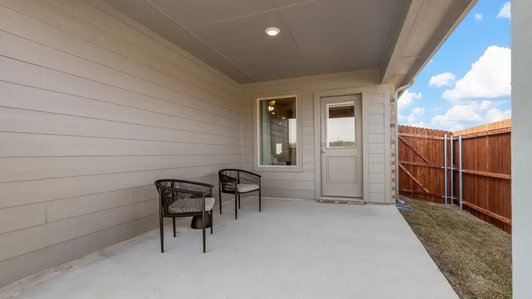 Exterior details and patio area of a home in Longhorn Estates, Fort Worth (Image 2).