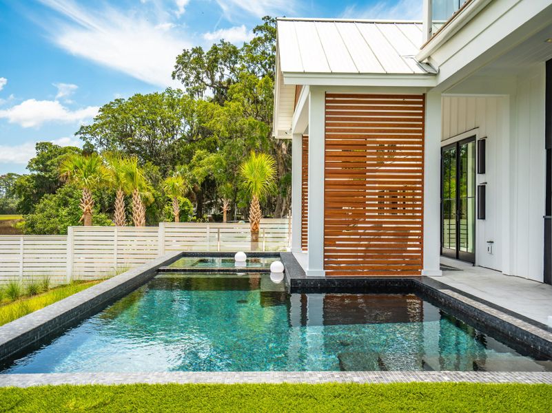 Exterior details and patio area of a home in , Charleston (Image 28). Exterior details and patio area of a home in , Charleston (Image 28).