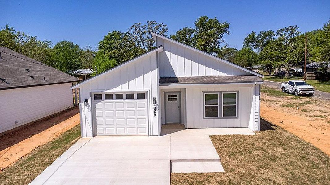 Front exterior of a new home in , Grand Saline, TX, highlighting curb appeal (Image 1). Front exterior of a new home in , Grand Saline, TX, highlighting curb appeal (Image 1).