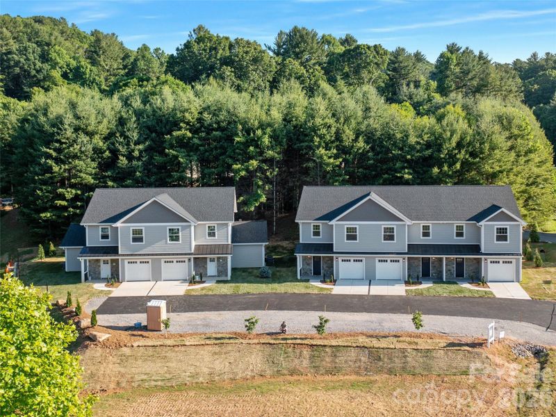 Front exterior of a new home in , Burnsville, NC, highlighting curb appeal (Image 26).