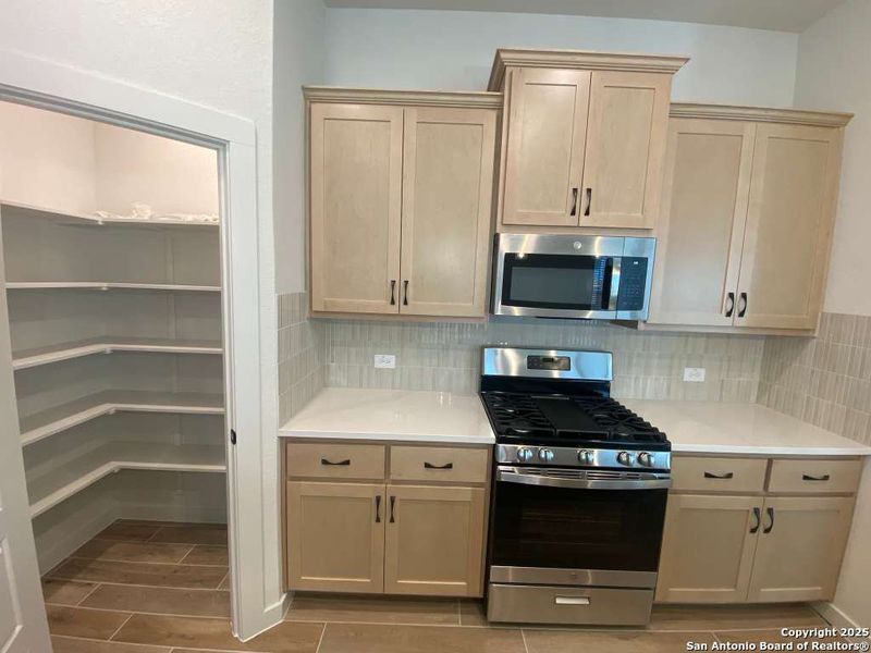 Furnished interior view inside a new home in Stream Waters, Seguin (Image 10).