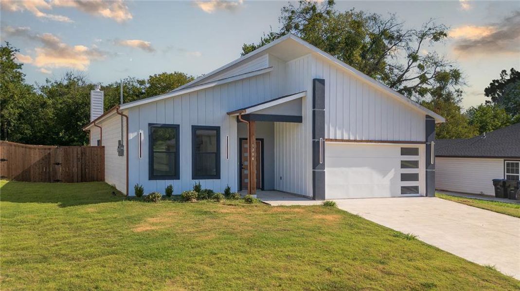 Front exterior of a new home in , Greenville, TX, highlighting curb appeal (Image 16). Front exterior of a new home in , Greenville, TX, highlighting curb appeal (Image 16).