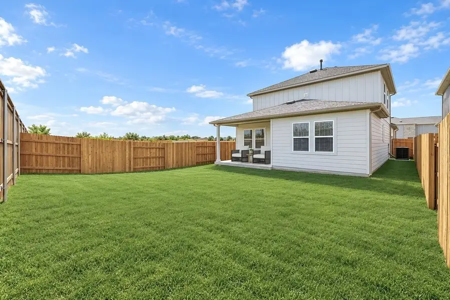 Exterior details and patio area of a home in Sunfield, Buda (Image 4).