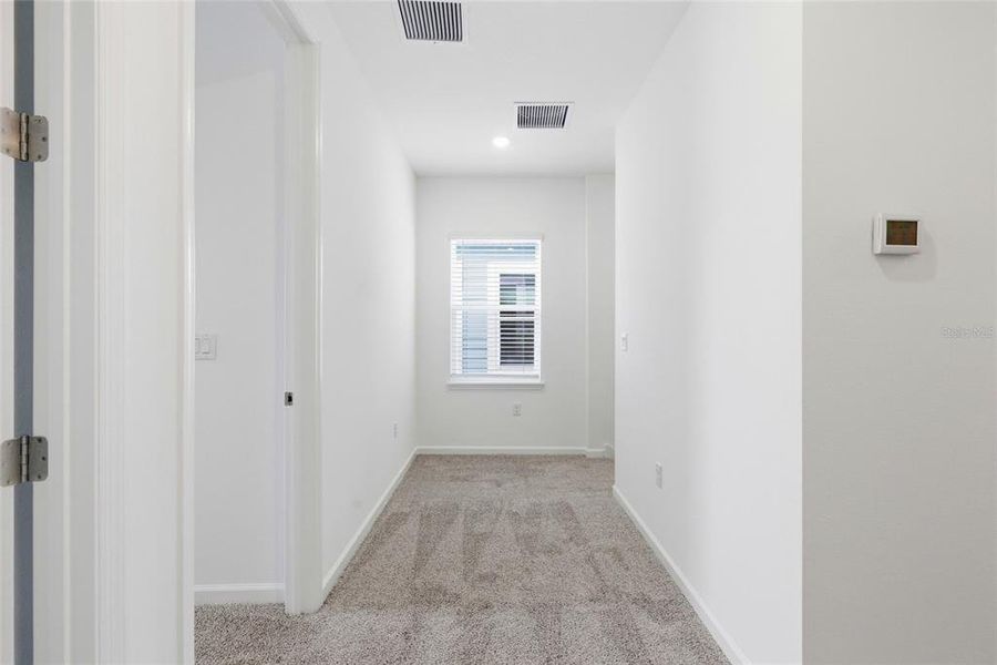 Spacious, unfurnished interior of a new home in Serenade at Ovation, Winter Garden (Image 17). Spacious, unfurnished interior of a new home in Serenade at Ovation, Winter Garden (Image 17).