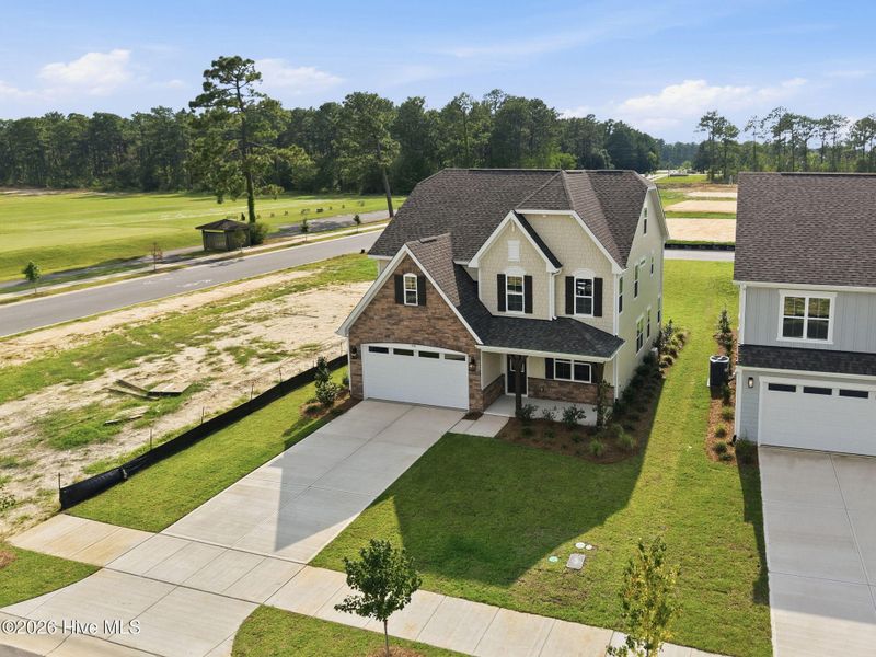 Front exterior of a new home in Legacy Lakes, Aberdeen, NC, highlighting curb appeal (Image 20).