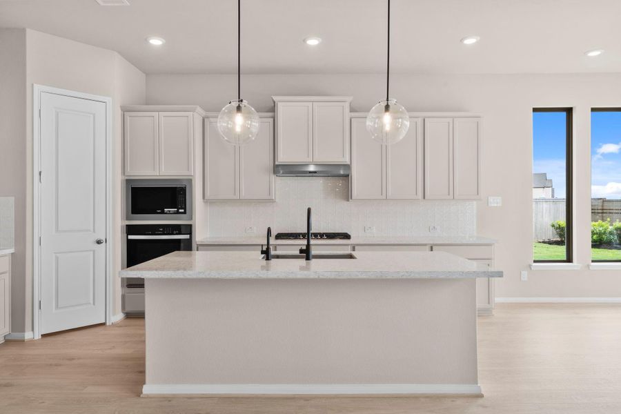 Furnished interior view inside a new home in Bridgeland, Cypress (Image 8).
