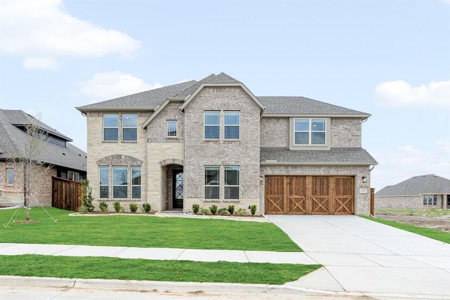 Front exterior of a new home in Meraki, Forney, TX, highlighting curb appeal (Image 26).