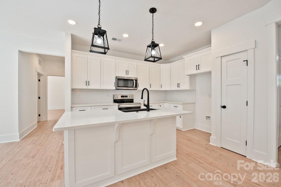 Furnished interior view inside a new home in , Concord (Image 7).