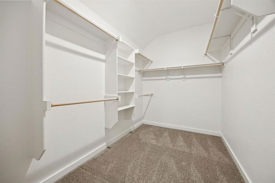Primary Closet in the Oscar home plan by Trophy Signature Homes – REPRESENTATIVE PHOTO