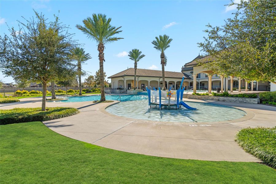 Dedicated Splash Pad and kids' water area next to the main pool, ideal for younger residents.