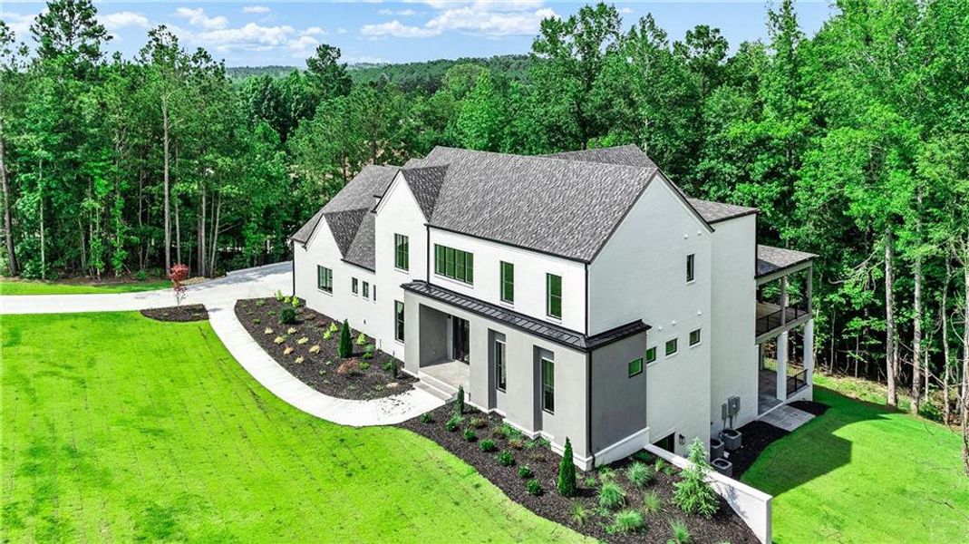 Front exterior of a new home in , Newnan, GA, highlighting curb appeal (Image 2).