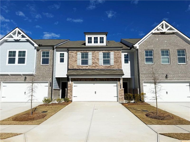 Front exterior of a new home in Union Village, McDonough, GA, highlighting curb appeal (Image 21).