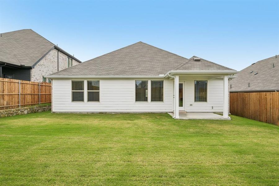 Exterior details and patio area of a home in Simpson Crossing - Signature Series, McKinney (Image 21). Exterior details and patio area of a home in Simpson Crossing - Signature Series, McKinney (Image 21).