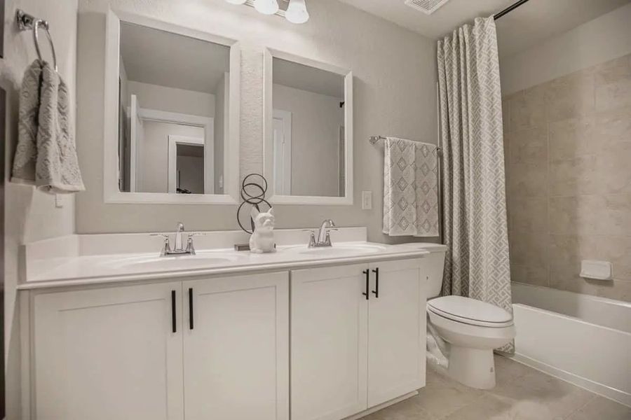 Representative furnished interior of a home built from the Pegasus by Chesmar Homes in Santa Rita Ranch, Liberty Hill (Image 12).