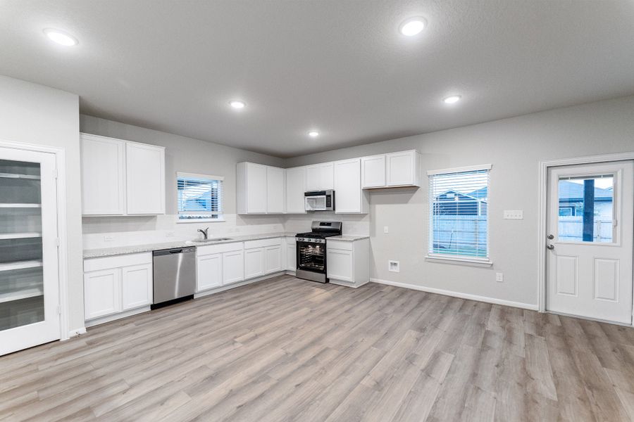 Furnished interior view inside a new home in Hennersby Hollow, San Antonio (Image 5).