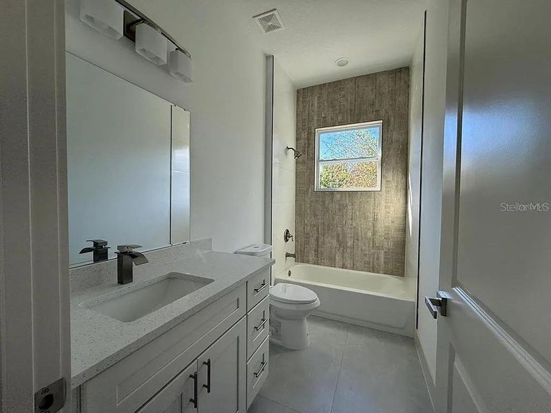 Furnished interior view inside a new home in , Port Charlotte (Image 9). Furnished interior view inside a new home in , Port Charlotte (Image 9).