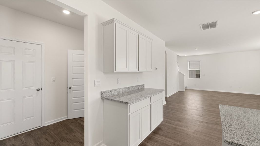 Representative furnished interior of a home built from the Mansfield by D.R. Horton in Brooks Station, Dacula (Image 9).