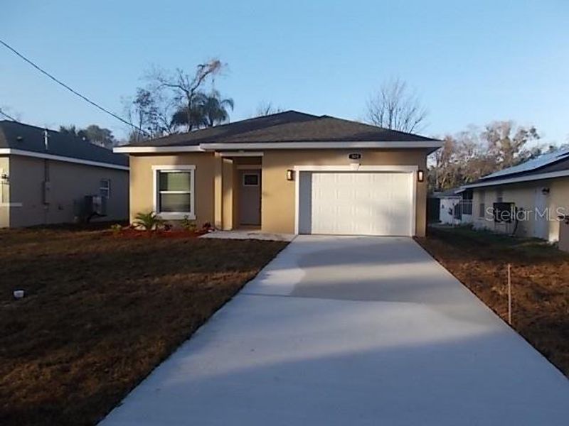 Front exterior of a new home in , Daytona Beach, FL, highlighting curb appeal (Image 1). Front exterior of a new home in , Daytona Beach, FL, highlighting curb appeal (Image 1).