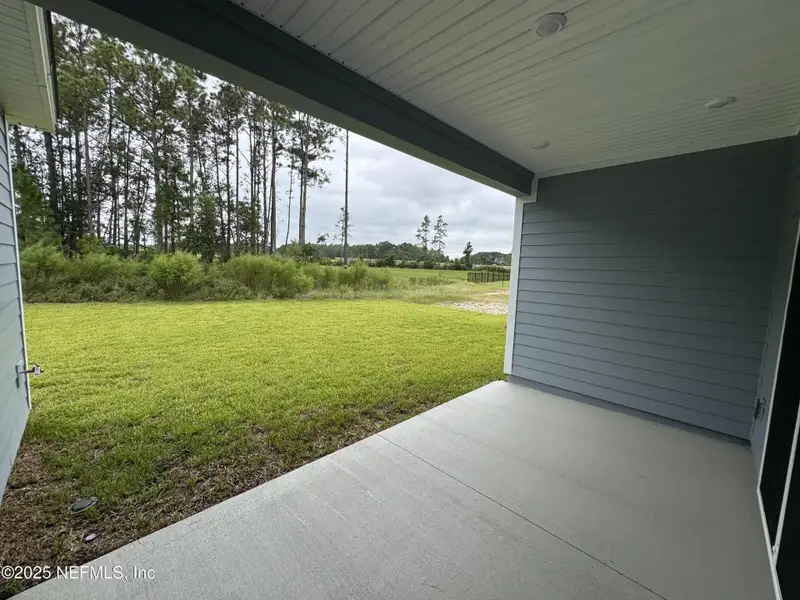 Exterior details and patio area of a home in , Green Cove Springs (Image 4).