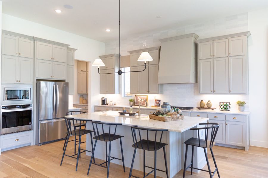 Representative furnished interior of a home built from the 5071 by Tradition Homes in Lakewood at Brookhollow – 60′ Lots, Prosper (Image 28).