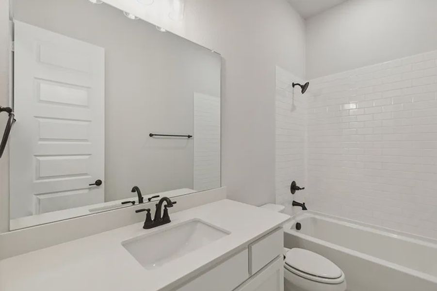 Representative furnished interior of a home built from the Logan by Cambridge Homes in Lake Park, Rowlett (Image 8).