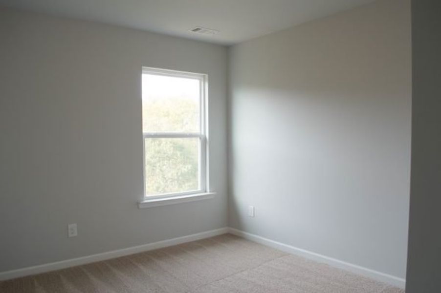 Representative unfurnished interior of a home built from the Mayfield by Piedmont Residential in The Reserve at Willow Oaks, Canton (Image 29).