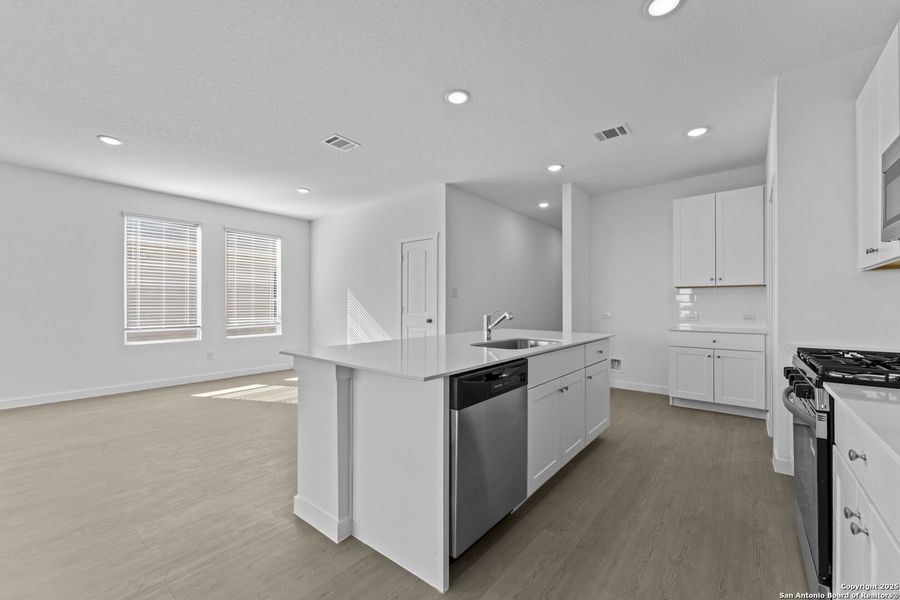 Furnished interior view inside a new home in Waterwheel: Coastline Collection, San Antonio (Image 8).