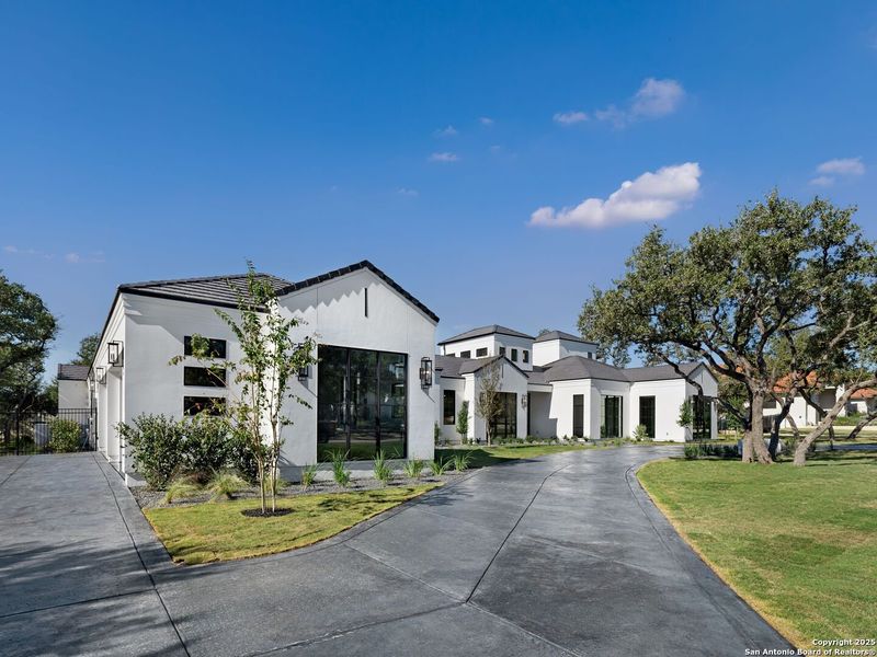 Front exterior of a new home in , San Antonio, TX, highlighting curb appeal (Image 25).