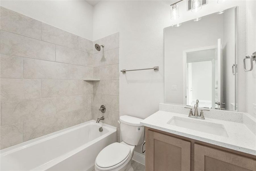 Furnished interior view inside a new home in Stone River Glen 60s, Royse City (Image 8).