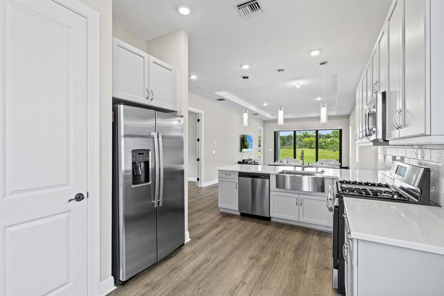 Furnished interior view inside a new home in , The Acreage (Image 6).