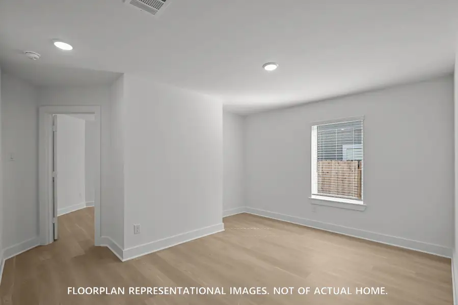 Spacious, unfurnished interior of a new home in Pinewood at Grand Texas, New Caney (Image 15).