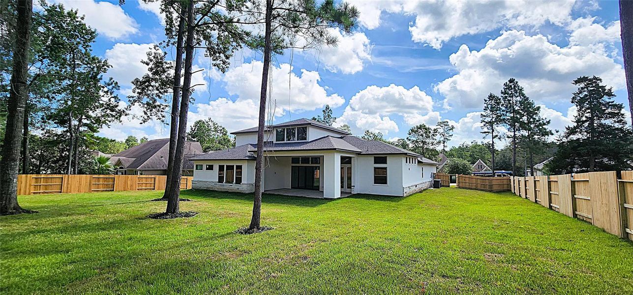 Front exterior of a new home in Stewart’s Forest, Conroe, TX, highlighting curb appeal (Image 15). Front exterior of a new home in Stewart’s Forest, Conroe, TX, highlighting curb appeal (Image 15).